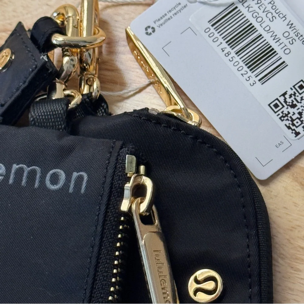 NWT Lululemon Dual Pouch Wristlet Black Gold Wordmark NWT - Picture 3 of 7